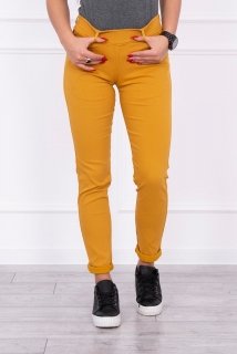Farebné dámske džínsy elastické horčicové